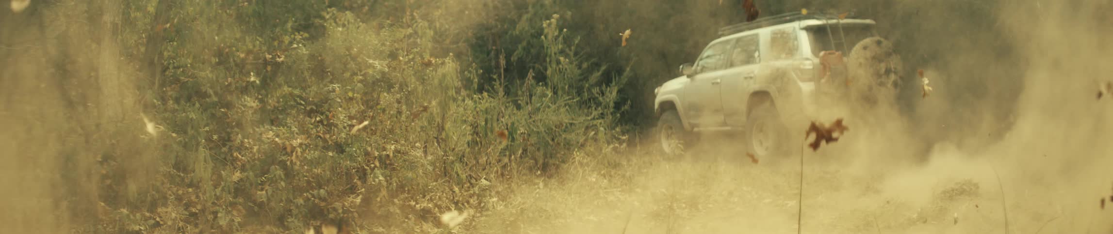 A view of a car driving offroad