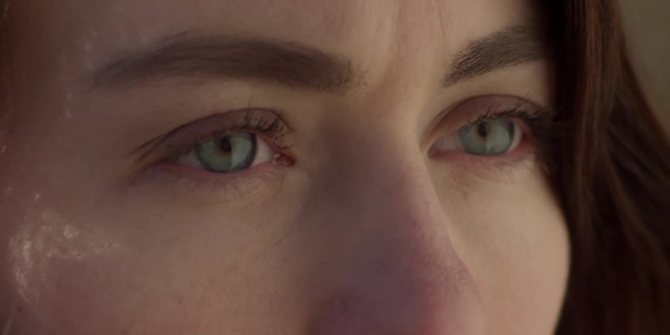 Close up of woman's eyes opening