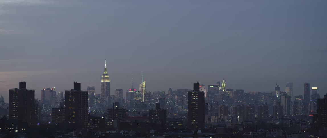 A cloudy city at sunset