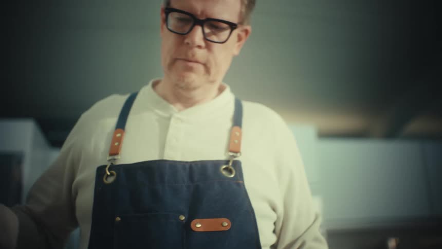 Spoon pours granulated sugar during recipe preparation