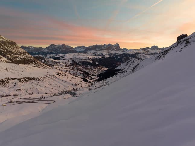 The mountain range is covered with white snow