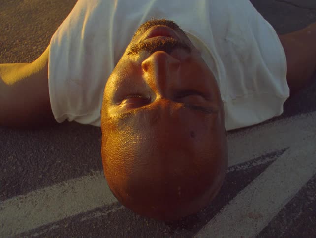 A man laying on a floor