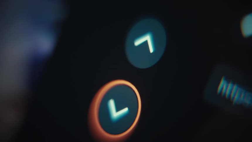 Cursor selects an arrow near a text field holding a url as a video plays