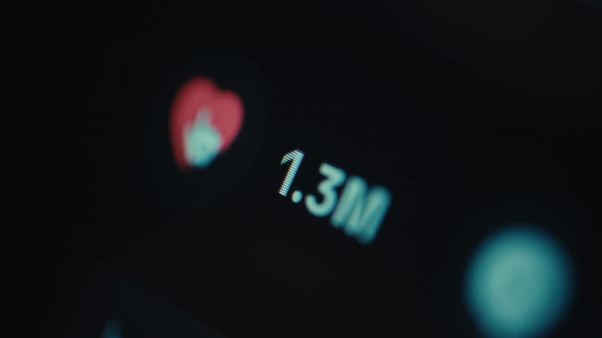 The heart icon is tapped on the device screen