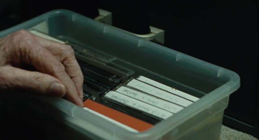 Opening bin with old tapes and CDs
