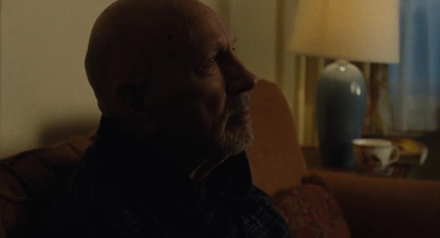 Sleeping old man woken up