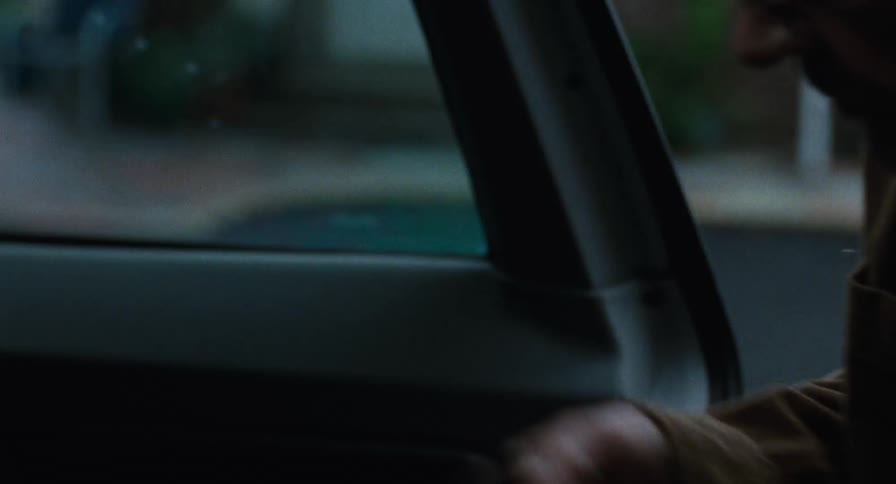 Close up of a man unloading his car