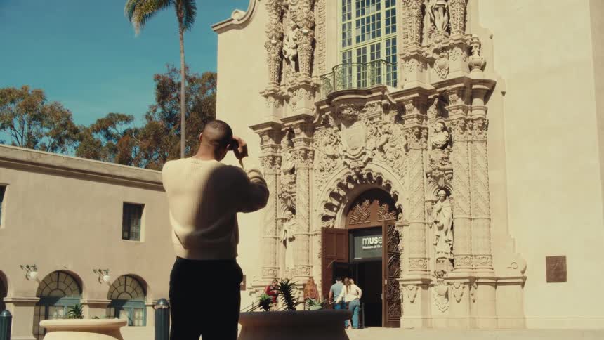 A man taking a picture of a building