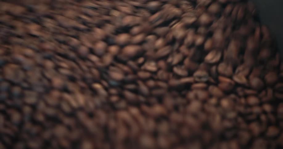 The machine is mixing and roasting the coffee beans