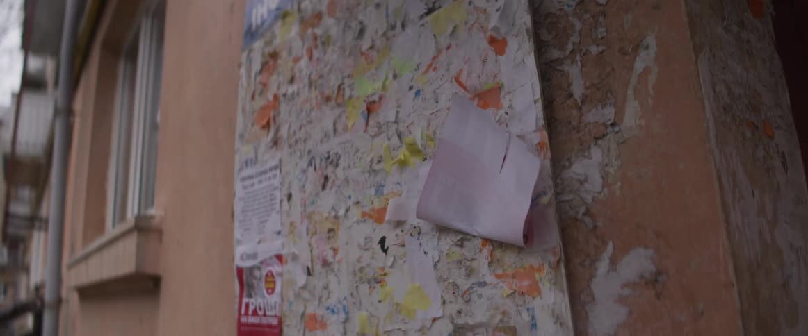 Some papers hanging on a wall