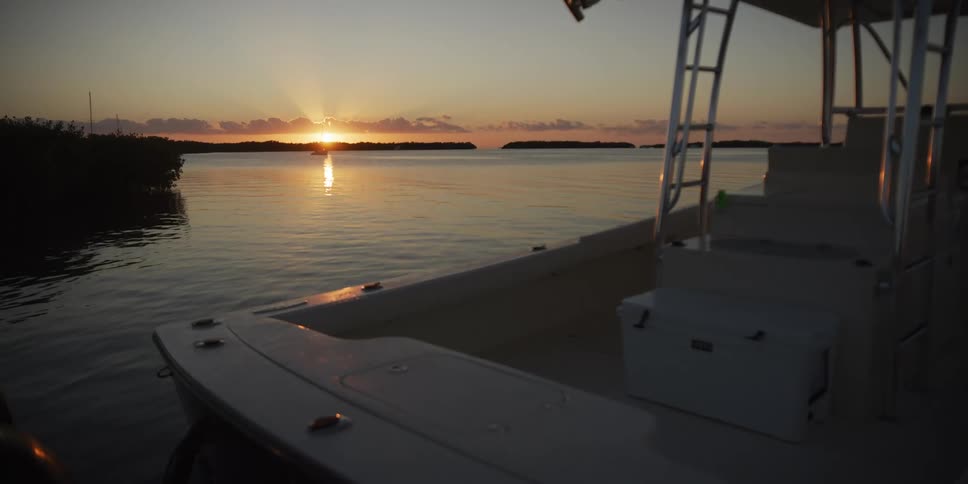 A view of a boat sitting out on the water