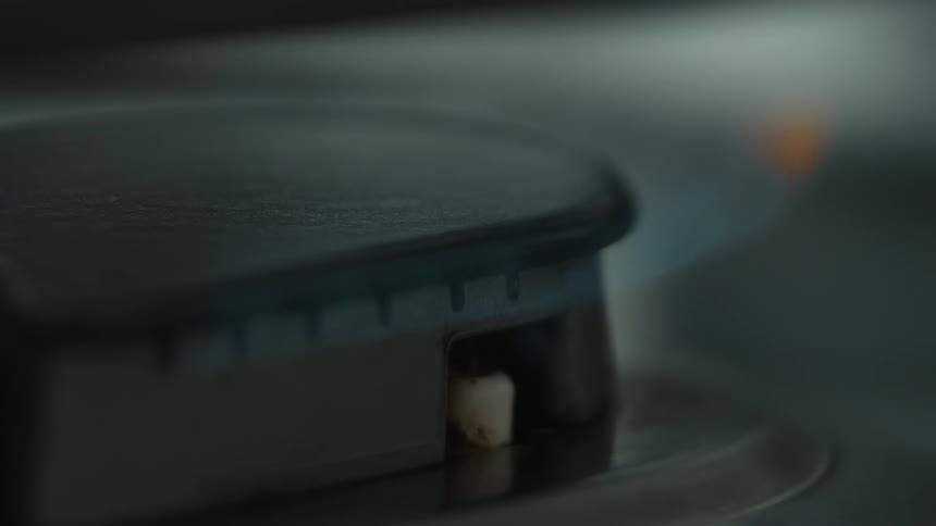 Close up of a burner igniting