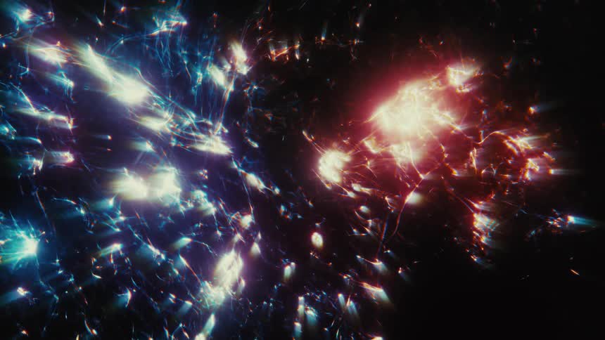 A beautiful display of glowing blue and red particles forming an abstract nebula in the cosmos