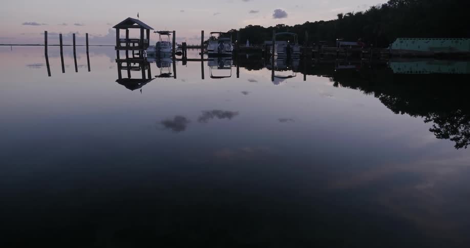 Boats docked at dusk