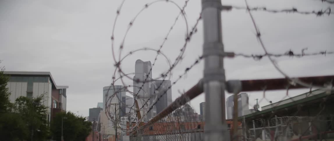 Barbed wire surrounded a building