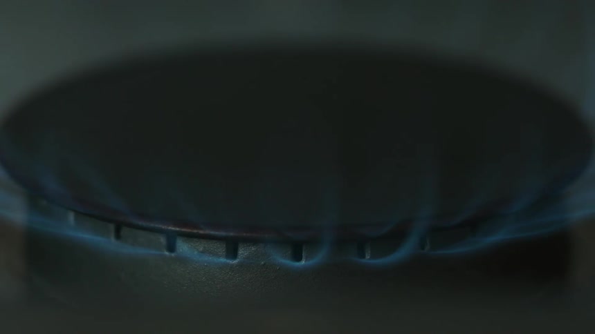 Close up of a burner igniting