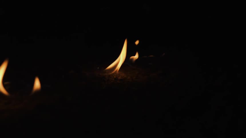 Fire burning brightly on the ground