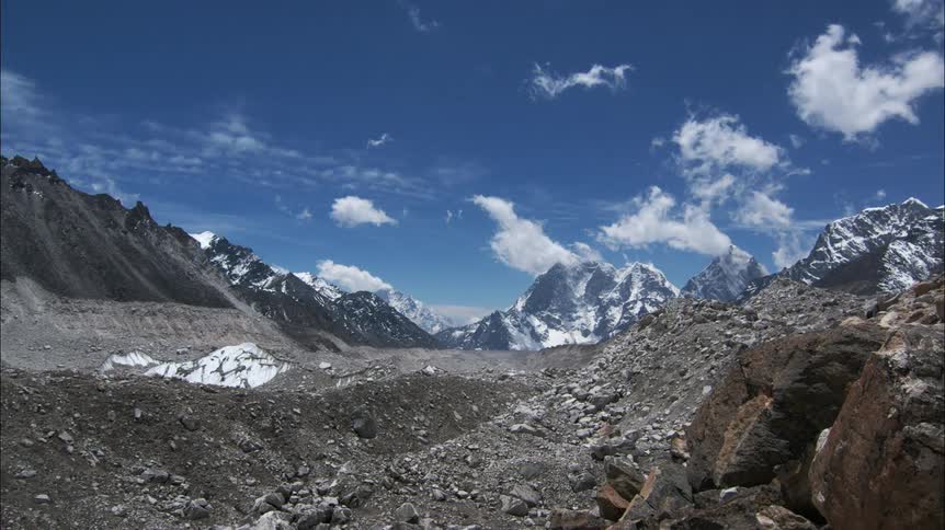 The clouds move fast over the mountain tops
