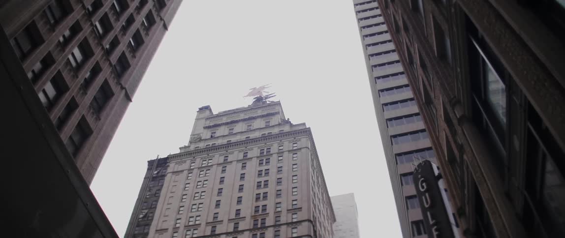 View looking up at skyscrapers in a city