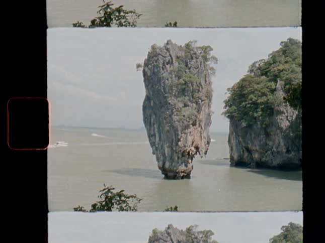 An authentic vintage 8mm film scan shows the famous James Bond Island, Ko Ta Pu, in Thailand