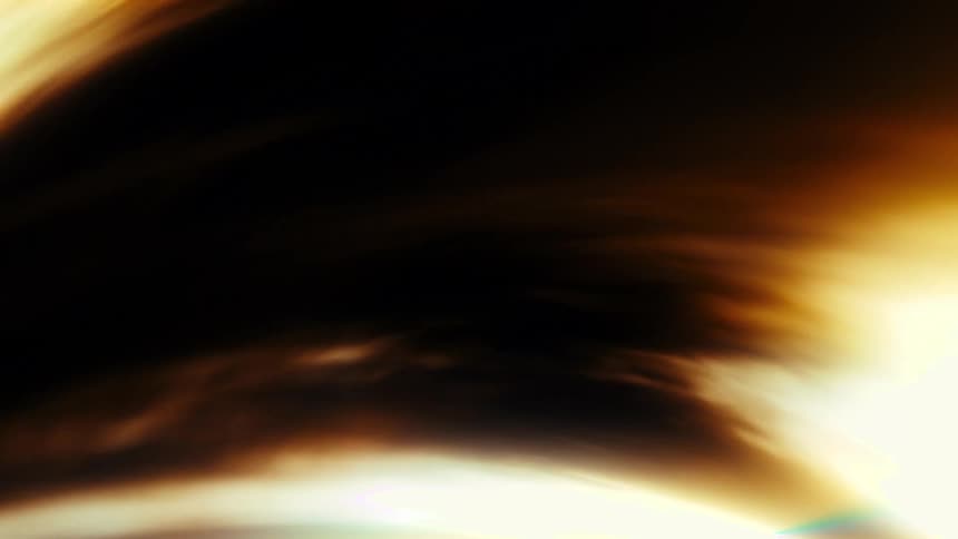 Abstract golden light and dark energy waves swirl in a mesmerizing, fluid motion
