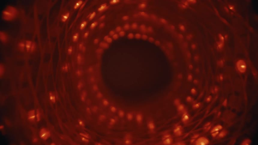 A mesmerizing journey through a glowing tunnel of pulsing red lights against a dark, abstract background