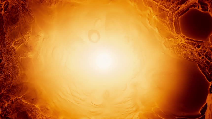 A mesmerizing display of golden liquid ink forming intricate, cell-like patterns from the edges inward