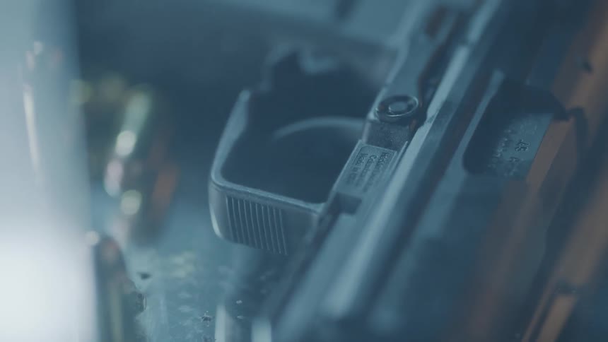 Smoke billows from a gun