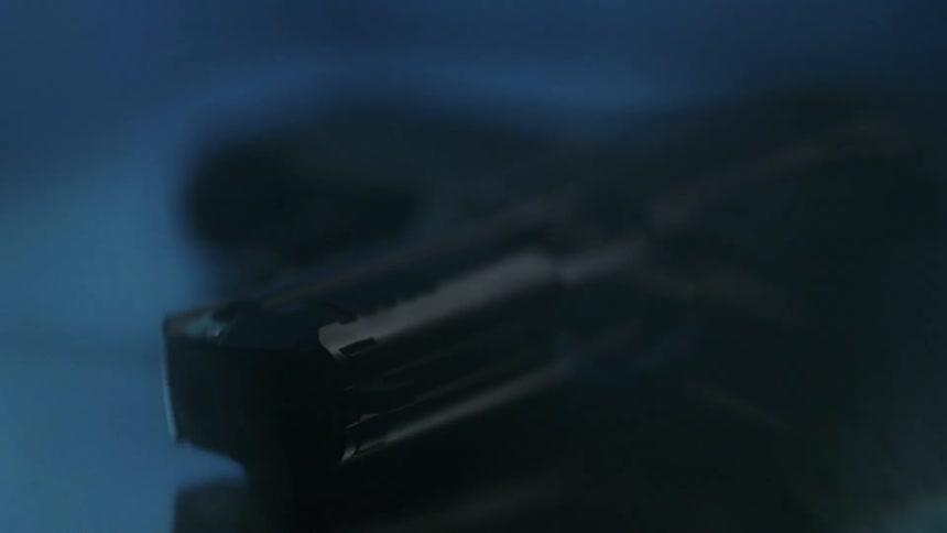 Close up of a gun on a table
