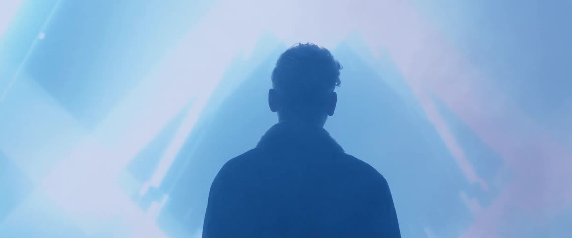 Strobe lights surround a person