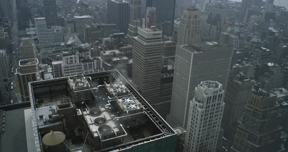 Fans spin on a rooftop in the city