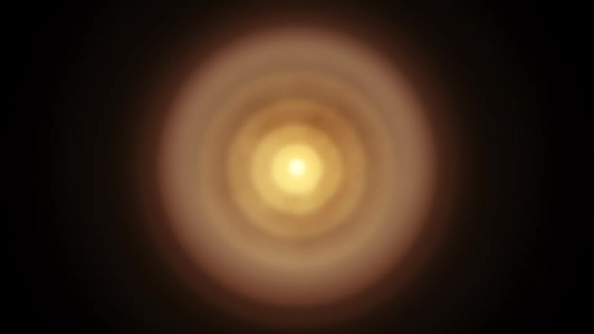 A shimmering golden orb with pulsating concentric rings against a black background