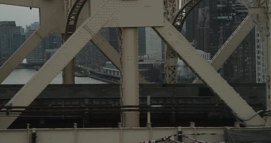 Vehicles crossing a city bridge