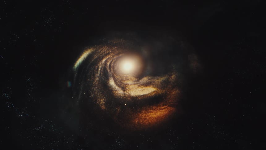 A realistic CGI animation shows a vibrant spiral galaxy rotating slowly in the darkness of deep space