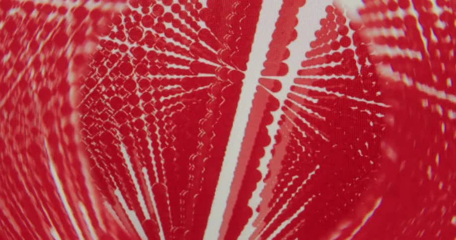 Abstract red pixelated patterns on a white background create a dynamic and glitchy visual effect