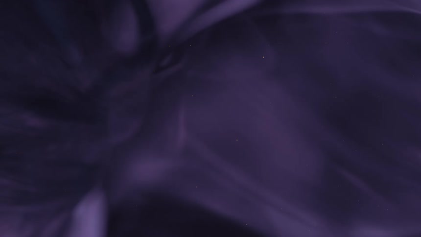 Ethereal blue smoke gently swirls with floating dust particles as the background slowly transitions to a deep, mysterious purple