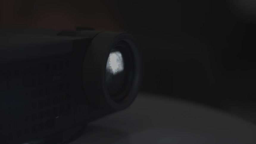 A projector in a dim room
