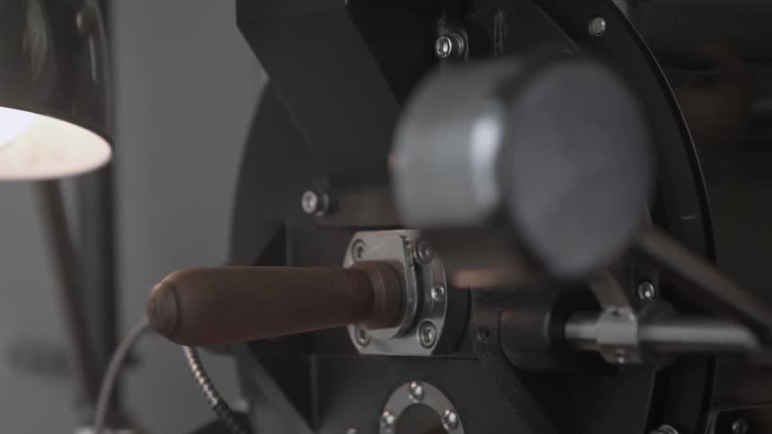 A knob rotates on a piece of machinery