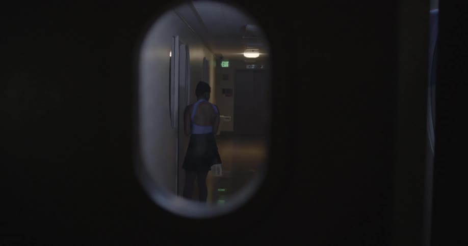 Dancer seen through oval size window