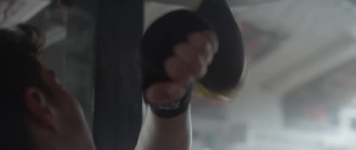 Man hitting a punching bag