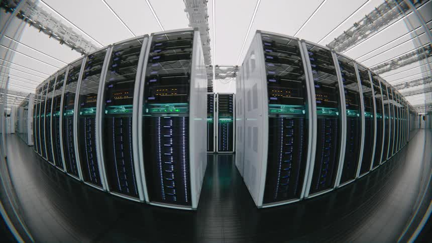 A slow, wide-angle fisheye dolly shot reveals rows of working server racks with blinking lights in a modern, brightly lit data center