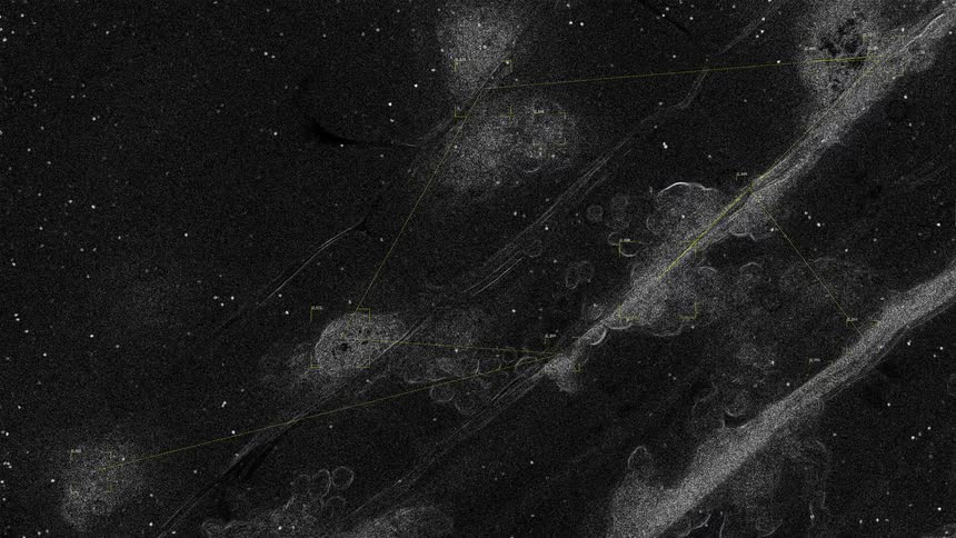 Abstract black and white animation of data points being tracked and connected within a digital network