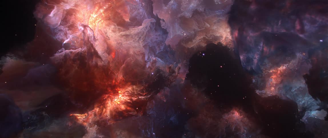 A slow, majestic journey through a colorful, glowing nebula in the vastness of deep space