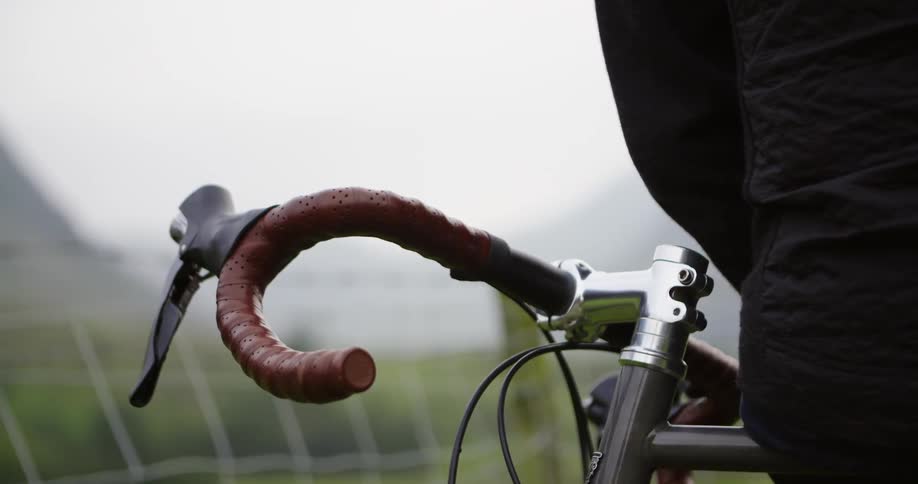 The leather covered handle of the 10 speed bicycle