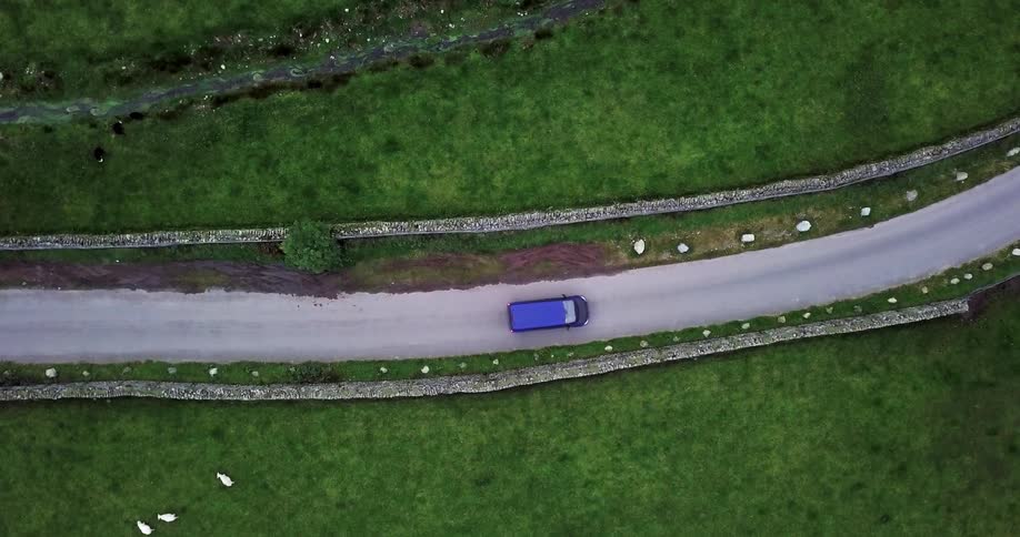 Car traveling on a country road