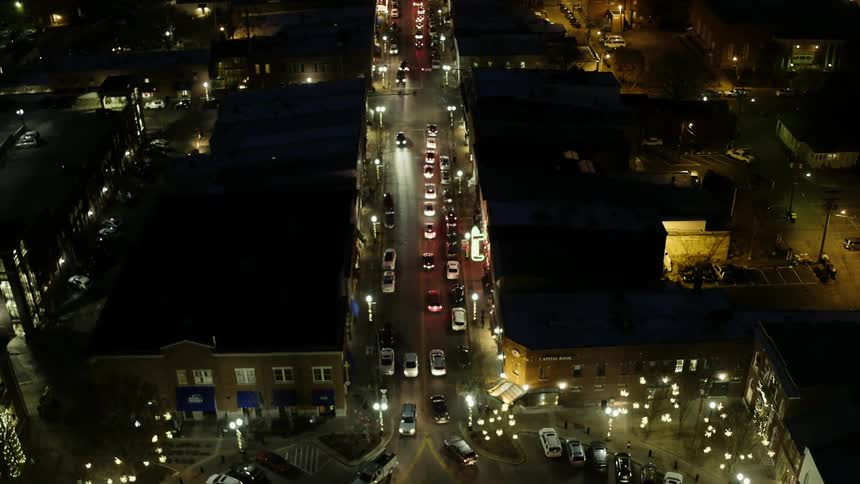 The streets below in this city are bright at night