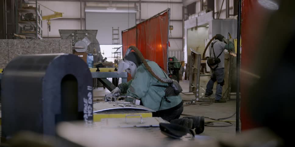 People are working in a shop together