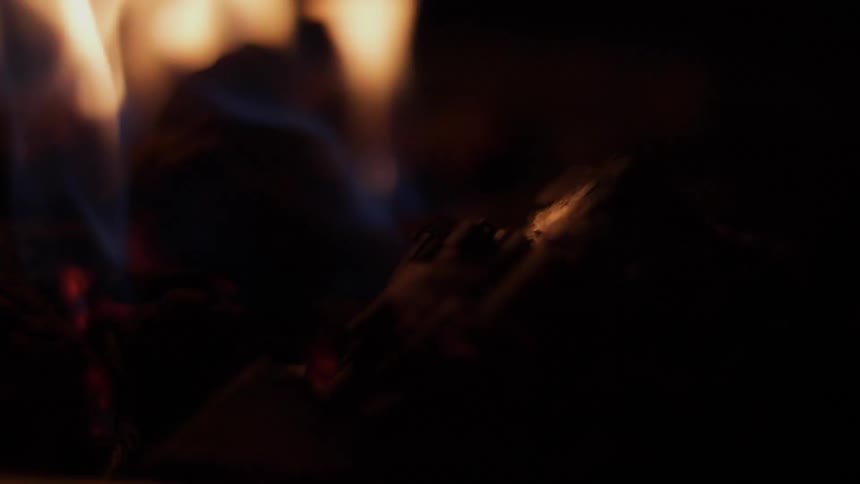 A close up view of a fire burning outside