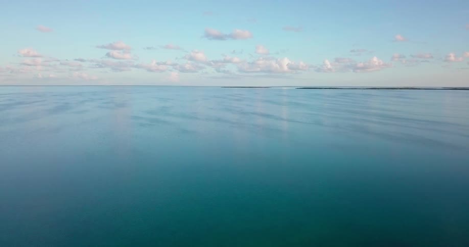 The blue waters of this ocean are calm