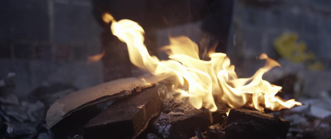 Flames burning in an open fire-pit